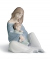 Set in pure porcelain and painted with soothing pastels, this glazed figurine captures pure serenity and love between a mother and her little one. Makes the perfect gift for any mother.