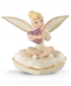 The fairest pixie of them all, Tinker Bell clutches a sparkling purple heart on a similarly shaped cushion in this limited-edition Disney figurine. Beautiful glazed and gold detail enriches already-elegant Lenox fine china.