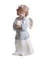 Utterly irresistible, the Heavenly Love figurine combines a sweet cherub and baby bunny in delicately glazed Lladro porcelain.