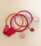 An adorable set of four rubber bracelets adorned with fun charms.Glass stonesStretch rubberImported