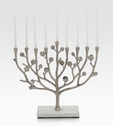 The intricate forms of nature inspired America's foremost metal artist to create this hand-crafted menorah with a glowing nickle-plated finish.From the Botanical Leaf CollectionCandles not includedNickle-plated metal12W X 4D X 13½Hand washImported
