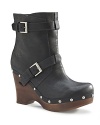 UGG® Australia rides the tough-chic moto trend in these stylish booties with a tender secret: sheepskin linings.