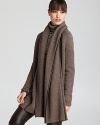 Leather piping lends an ultra-luxe feel to this oversize Vince sweater--a can't-live-without staple come fall.