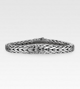 A modern, edgy look is intricately handwoven in polished sterling silver. Signature dual-locking clasp About 8½ long Made in USA