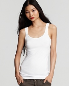 The basic white tank is a wardrobe essential. Layered, teamed or on its own, this top is a building block for statement style. James Perse's long-length iteration is a personal favorite with cropped cargos for spring. You can't have just one! The basic white tank is a wardrobe essential. Layered, teamed or on its own, this top is a building block for statement style. James Perse's long-length iteration is a personal favorite with cropped cargos for spring. You can't have just one!