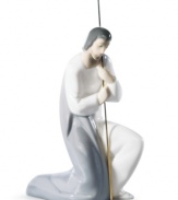 With his shepherd's staff in hand, Joseph kneels before the miracle that is the birth of baby Jesus. Handcrafted by Lladro, this precious figurine is the very essence of Christmas.