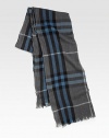 Ultra soft and ultra luxurious, this crinkled scarf is complemented by a signature Burberry check pattern.55% extra fine merino wool/45% cashmereAbout 17 X 78Dry cleanImported