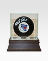 After a grueling 54 years without the Stanley Cup and seven stomach-churning finals games, the New York Rangers finally conquered the championship in 1994. As goaltender for the Rangers, Mike Richter's unwavering performance proved an essential part of the winning equation. Mike Richter has hand-signed this New York Rangers hockey puck and arrives in a glass/wood display case. Includes certificate of authenticity 8 X 8 X 8 Made in USA 