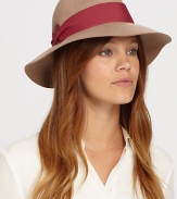 Remain warm and stylish this season with this floppy fedora style trimmed with pleated cotton band and feather detail for a timeless finish.WoolOne size fits mostSpot cleanImported