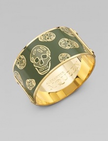 This feminine take on punk rock features creepy-cool skulls, stud details, and Alexander McQueen engraved logo on the interior and exterior.Enamel Brass Diameter, about 2½ Width, about 1¼ Made in Italy This feminine take on punk rock features creepy-cool skulls, stud details, and Alexander McQueen engraved logo on the interior and exterior.Enamel Brass Diameter, about 2½ Width, about 1¼ Made in Italy