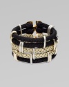 A five-row, rope design with two-tone metal accents and a goldtone clasp. RopeTwo-tone metalLength, about 8¼Spring clasp closureMade in USA