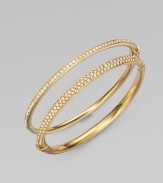 EXCLUSIVELY AT SAKS. Sparkling crystals shimmer within a glowing, golden hinged bangle. Crystal 18k goldplated Diameter, about 2¼ Push-lock clasp Imported Please note: Bracelets sold separately.