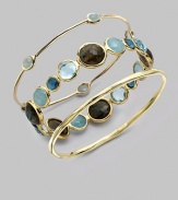From the Rock Candy® Collection. Five, pretty, milky aquamarine cabochon stations on a delicate 18k gold bangle. Milky aquamarine18K goldSlip-on styleDiameter, about 2½Imported 