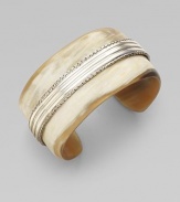 From the Bedeg Collection. Exotic horn features a shimmering stripe of sterling silver.Horn Sterling silver Width, about 1½ Diameter, about 2½ Made in BaliPlease note: There may be color variations due to the unique nature of buffalo horn. 
