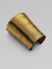 Totally simple and totally fabulous, this stunning open cuff, worthy of an ancient Egyptian princess, is gracefully formed of delicate brass wires with a polished finish.BrassDiameter, about 2½Length, about 4¼Imported