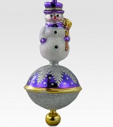 EXCLUSIVELY AT SAKS. A glittery snowman rests atop this sparkling ornament, carefully hand-blown and painted by artisans. Hand-blownHand-painted6½ tallImported