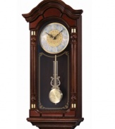 Grace your home with the classic charm of this wooden wall clock from Seiko. Featuring a hand-rubbed brown solid oak case with brass pendulum and glass window. Round silvertone and goldtone engraved dial with logo, numeral indices and vine pattern. Westminster/Whittington quarter hour chime and hourly strikes. Volume control and nighttime chime silencer. Volume control and nighttime chime silence features. One C battery included. Measures approximately 28 x 12-3/5 x 6 inches.
