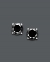 Elegance in ebony. Black diamonds (3/4 ct. t.w.) set in 14k white gold give this pair of earrings a sophisticated touch. Approximate diameter: 3/4 inch.