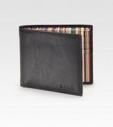 Signature stripes line this supple leather billfold, crafted in Italy.Eight card slotsCenter bill compartment5¼W X 3¾HMade in Italy