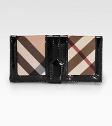 A lasting accessory with a classic look, this wallet in iconic check PVC is trimmed in glossy patent leather. Snap closure One coin pouch Two dollar pockets ID pocket Nine credit card slots Leather lining 7½W X 4¼H X 1D Imported
