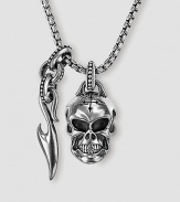 Unique neckwear features a finely detailed skull and Sparta accent in polished sterling silver. Includes 26 chain Skull: ½W X ¾H Sparta accent: ¼W X 1H Made in USA
