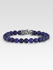 Rugged, lightly-textured lapis beads stand in stark contrast to the bracelet's hand-forged, sterling silver clasp. Beads, 8mm Length, about 8½ Lobster clasp Made in USA Rugged, lightly-textured lapis beads stand in stark contrast to the bracelet's hand-forged, sterling silver clasp. Beads, 8mm Length, about 8½ Lobster clasp Made in USA