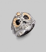A modern expression of singular style, crafted in detailed sterling silver with rose gold detail and onyx eye detail. Sterling silver Rose gold Onyx About 1 diam. Imported 