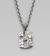 A richly textured dogtag design is crafted in polished sterling silver on a modern chain necklace. Adjustable necklace, about 20 Imported