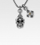 A wholly original and utterly fashionable look in braided sterling silver with a weighty skull accent, and another cross charm studded with 18K gold. From the UnKaged Collection Skull, 1H Cross, ¾H Endless chain, 26 long Made in USA