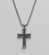 A finely detailed silver chevron cross pendant is centered with brilliant black pavé diamonds. Diamonds, 0.65 tcw Chain length 22 Imported