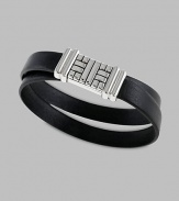 A double-wrapped strap of premium leather is interrupted by a basketwoven silver clasp. From the Bedeg Collection Leather Silver About 7 diam. Magnetic pusher clasp Imported 