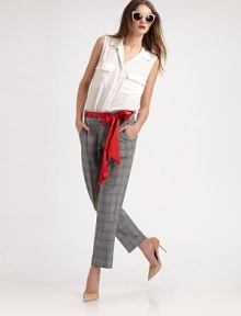 EXCLUSIVELY AT SAKS. EXCLUSIVELY AT SAKS.