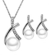 Seal it with a kiss. This matching pendant and earrings set highlights a chic, x-shaped design with cultured freshwater pearls (6-7 mm) and round-cut diamond accents. Set in sterling silver. Approximate length: 18 inches. Approximate drop (pendant): 3/4 inch. Approximate drop (earrings): 3/4 inch.