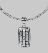 Polished silver with a military mind, crafted in a dogtag design with the look of laticework. From the Bedeg Collection Sterling silver Chain necklace 1W X 2¼L Lobster clasp Made in Bali 