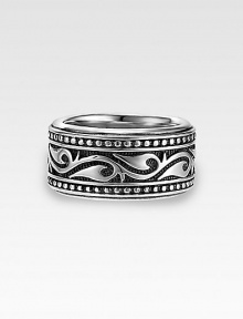 A handsome, sterling silver band is enriched by scrolling Sparta engraving. 13mm wide Made in USA A handsome, sterling silver band is enriched by scrolling Sparta engraving. 13mm wide Made in USA