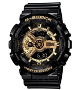 In-your-face style. There's no denying this bold watch by G-Shock. Black resin strap and round case. Gold logo embossed at bezel. Multi-layered black and gold tone analog-digital display dial features shock resistance, magnetic resistance, auto LED, flash alert, world time, four daily alarms & one snooze, stopwatch, speed indicator, countdown timer, mute function and 12/24-hour formats. Quartz movement. Water resistant to 200 meters. One-year limited warranty.