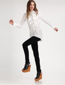 EXCLUSIVELY AT SAKS. EXCLUSIVELY AT SAKS.