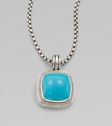 From the Albion Collection. Dazzling diamonds surround this smooth, domed turquoise stone set in sterling silver. TurquoiseDiamonds, .48 tcwSterling silverSize, about ½ Sterling silver baleImported Please note: Chain sold separately. 
