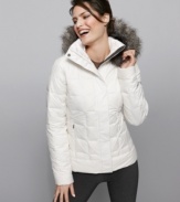 Ideal for a day of slope side fun, Columbia's quilted jacket keeps you toasty in high style with a faux fur hood. (Clearance)