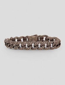 A modern look in warm, cocoa bronze with fine engraving. Bracelet, about 8½ long Dual locking closure Made in USA