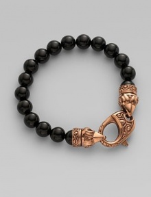 A bold string of Lucite onyx beads features a handsome raven's-head clasp in goldplated sterling silver. Lucite beads Goldplated sterling silver Length, about 9 Diameter, about 3 Lobster clasp closure Imported A bold string of Lucite onyx beads features a handsome raven's-head clasp in goldplated sterling silver. Lucite beads Goldplated sterling silver Length, about 9 Diameter, about 3 Lobster clasp closure Imported