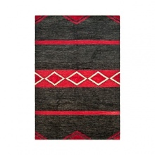 A luxurious adaptation of the Navajo rugs in Mr. Lauren's personal collection, this Ralph Lauren rug combines two ancient knotting techniques--the Soumak flat loop weave and Peshawar pile weave--in one design for rare and varied sheen. Vegetable dyes were used to enhance the naturally rustic appearance of the fibers. A luxurious adaptation of the Navajo rugs in Mr. Lauren's personal collection, this Ralph Lauren rug combines two ancient knotting techniques--the Soumak flat loop weave and Peshawar pile weave--in one design for rare and varied sheen. Vegetable dyes were used to enhance the naturally rustic appearance of the fibers.