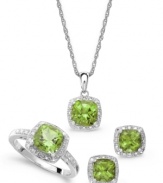 A subtle green sheen. Cushion-cut peridots (4-3/4 ct. t.w.) and sparkling diamond accents adorn this pretty matching jewelry set. Includes a pendant, stud earrings and ring in sterling silver. Approximate necklace length: 18 inches. Approximate drop: 1/2 inch. Approximate earring diameter: 1/4 inch. Size 7.