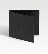 The foundation of any gentleman's style, crafted from lasting, durable coated canvas with subtle logo detail. Bill compartment Eight credit card slots 4W X 3H Made in Italy 