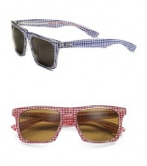 The classic look is updated with a unique touch: gingham-checked fabric inlaid across the acetate frames. 100% UV protective Imported