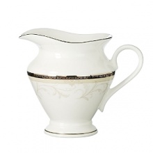 Brocade achieves an understated elegance by a combination of three design elements: a richly textured pattern of acanthus leaves; the neutral versatility of taupe; and a dramatic black band with Greek key detailing in platinum. Brocade achieves an understated elegance by a combination of three design elements: a richly textured pattern of acanthus leaves; the neutral versatility of taupe; and a dramatic black band with Greek key detailing in platinum.