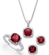 Crimson chic. Round-cut garnets (4-3/4 ct. t.w.) and sparkling diamond accents adorn this pretty matching jewelry set. Includes a pendant, stud earrings and ring in sterling silver. Approximate necklace length: 18 inches. Approximate drop: 1/2 inch. Approximate earring diameter: 1/4 inch. Size 7.