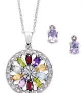 Stun them with a myriad of color. Victoria Townsend's matching pendant and earrings set features oval-cut amethyst (1-1/3 ct. t.w.), blue topaz (1/2 ct. t.w.), citrine (3/8 ct. t.w.), garnet (1/2 ct. t.w.) peridot (1/2 ct. t.w.) and diamond accents. Crafted in sterling silver. Approximate length: 18 inches. Approximate drop: 1-3/16 inches. Approximate drop (earrings): 5/16 inch.