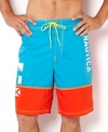 Get colorful by water in these bright board shorts by Nautica.