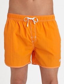 With stitched details and a grip-tape back patch pocket, these stylish swim trunks are both sporty and functional.Elastic drawstring waistStich detail at flySlash side pocketsBack grip-tape patch pocketInseam, about 4½PolyamideMachine washImported With stitched details and a grip-tape back patch pocket, these stylish swim trunks are both sporty and functional.Elastic drawstring waistStich detail at flySlash side pocketsBack grip-tape patch pocketInseam, about 4½PolyamideMachine washImported
